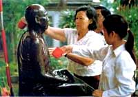 Statue washing rite